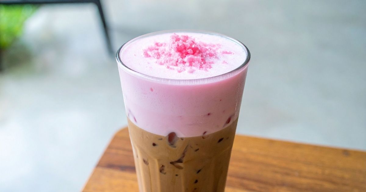 Colorful non-coffee Starbucks drinks including a pink drink, matcha latte, and chai
