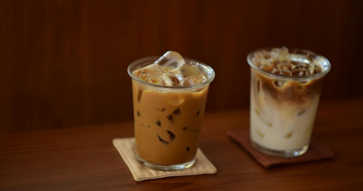 A Starbucks cup and a Dutch Bros cup side by side for comparison